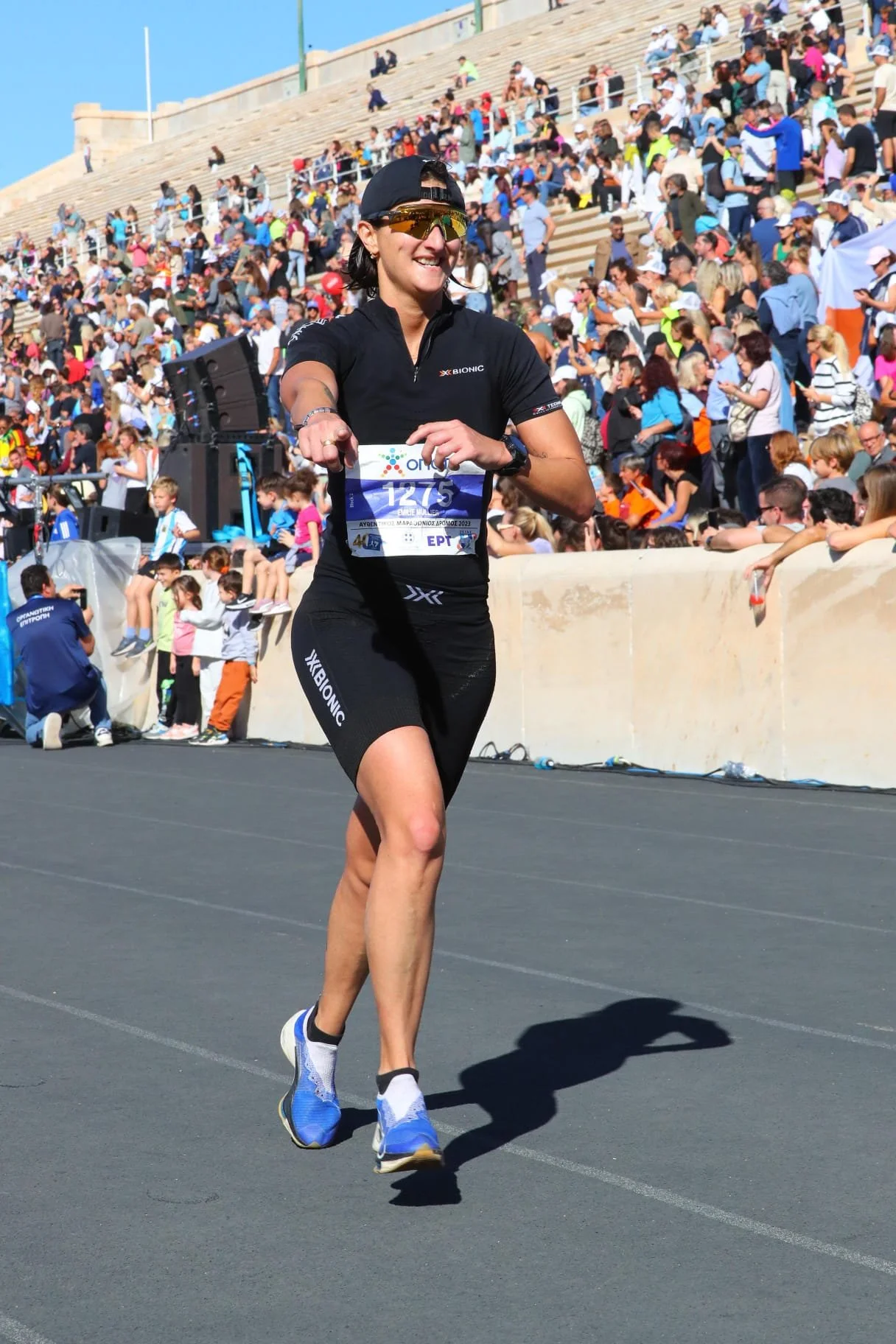 Emilie finishing the Athens marathon in the Panathenaic Stadium